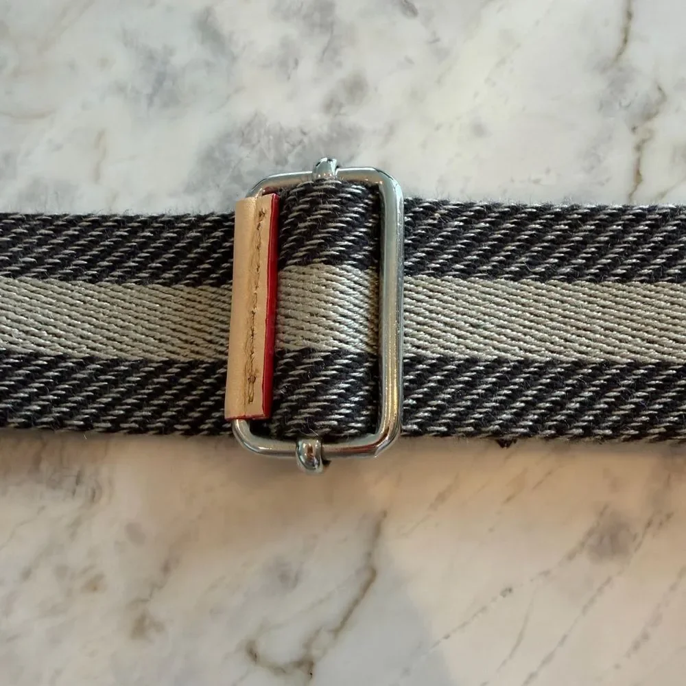Grey Leather crossbody bag with Cream Handles and Red piping across the lining
